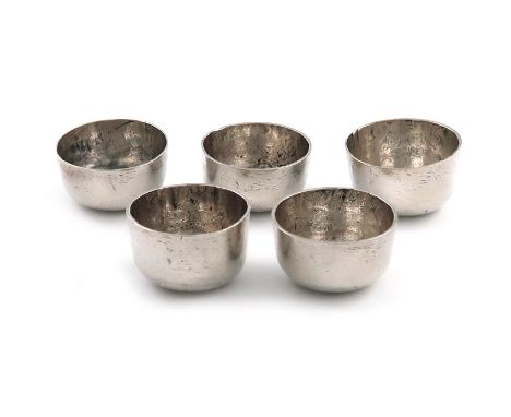 A rare set of five late 17th century miniature silver toy tea bowls, maker's mark of I.F with a star below, circa 1685, plain