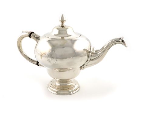 λA George II Scottish silver teapot, by Edward Lothian, assay master Hugh Gordon, Edinburgh 1749, baluster form, leaf capped 