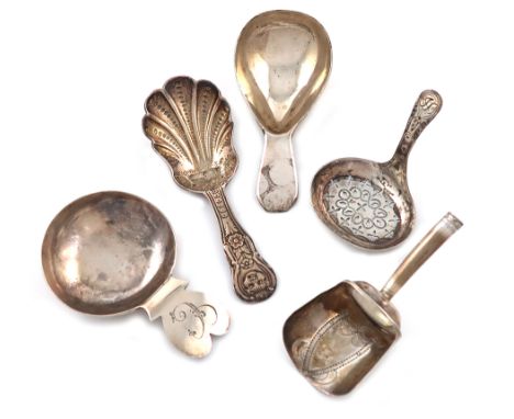 A collection of five antique silver caddy spoons, various dates and makers, including: a George III one by Thomas Willmore, B