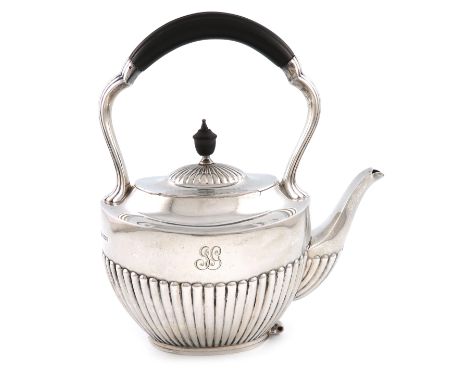 An Edwardian silver kettle, by William Hutton and Sons, Sheffield 1909, oval form, part-fluted decoration, central carrying h