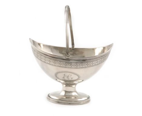 A George III provincial silver swing-handled sugar basket, by Hampston and Prince, York 1790, also marked with town mark, ova