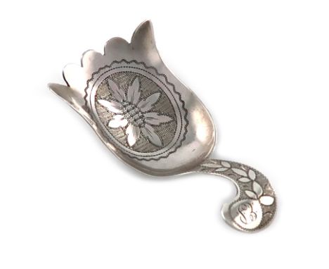 A George III silver caddy spoon, by Cocks and Bettridge, Birmingham 1810, shovel bowl, wavy-edge border, engraved with a flow