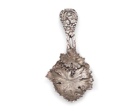 A George IV cast silver caddy spoon, by Reily and Storer, London 1828, leaf shaped bowl, the handle with grapes and pierced v