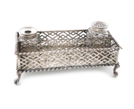A George III silver inkwell, by Samuel Herbert &amp; Co, London 1765, rectangular form, the gallery pierced with chevron deco