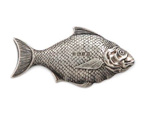 A novelty silver fish caddy spoon, by Thomas Bradbury and Son, Sheffield 1910, with scale decoration, length 7.5cm, approx. w