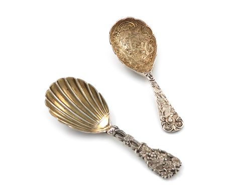 A Victorian cast silver caddy spoon, by George Adams, London 1856, the gilded bowl with foliate decoration, the handle with a