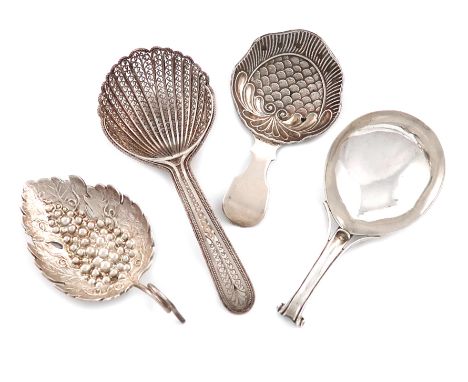 A small collection of four antique silver caddy spoons, comprising: a George III one by George Smith, London 1787, bifurcated