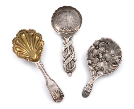 A small mixed lot of three antique silver caddy spoons, comprising: a Victorian one by Foxall &amp; Co, Birmingham 1853, flut