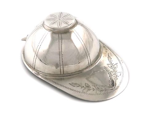 A large George III novelty silver jockey cap caddy spoon, maker's mark ?N, London 1817, bright-cut decoration, with a shield 