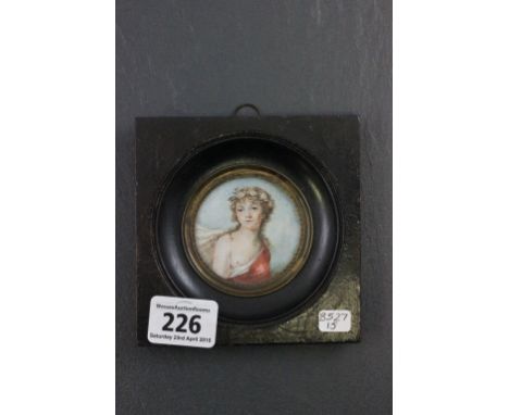 An Erotic miniature portrait painting of girl with flowers in her hair