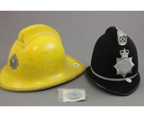 Royal Air Force Fireman's Helmet  together with a Policeman's Helmet