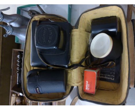 Cased Zenit EM Moshva 80 Camera and Accessories together with a Tripod and a Walking Stick