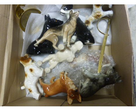 Ten Ceramic Dogs and a Group of Brass Ware