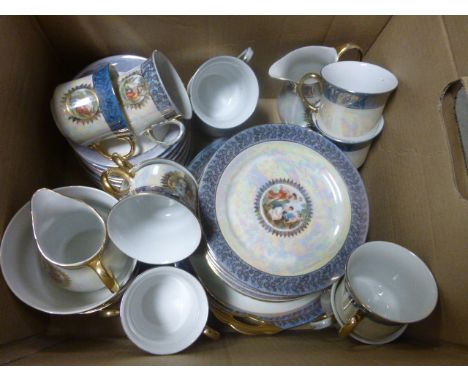Continental Lustre Tea Service decorated with panels of classical maidens