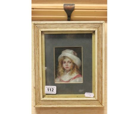 Oil on brass portrait miniature of a young girl in soft brimmed hat
