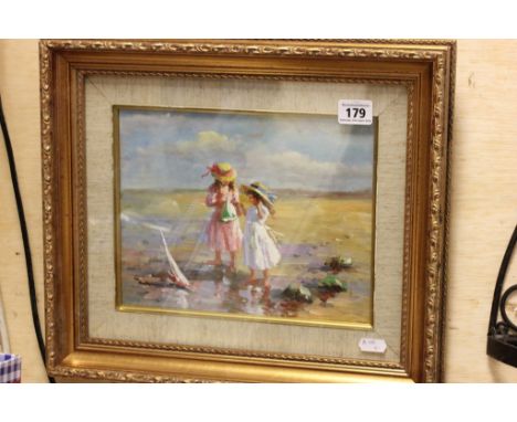 Gilt framed oil painting portrait of children playing with sailboat at the seaside