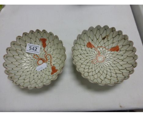 Pair of Fluted Ceramic Bowls, each decorated with an open net design and orange toggles