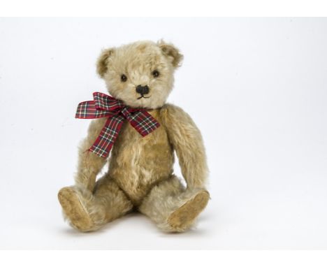 Heather, a British 1940s teddy bear, probably Alpha Farnell, with golden mohair, orange and black glass eyes, black stitched 