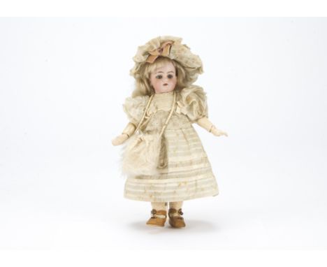 A small Heinrich Handwerck 99 child doll, with blue sleeping eyes, pierced ears, blonde mohair wig, jointed composition body,