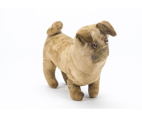 A Dean’s Rag Book Co. printed cloth pug, circa 1918, of beige cotton, clear and black glass eyes with brown painted backs, wi