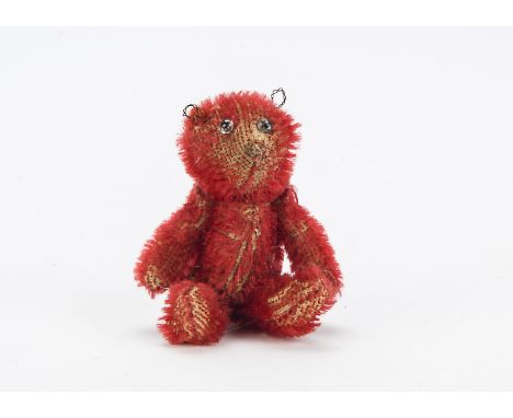 Lugless Douglas, a rare Farnell red mohair ‘soldier’ teddy bear, with clear and black glass eyes, black stitch for a nose, re