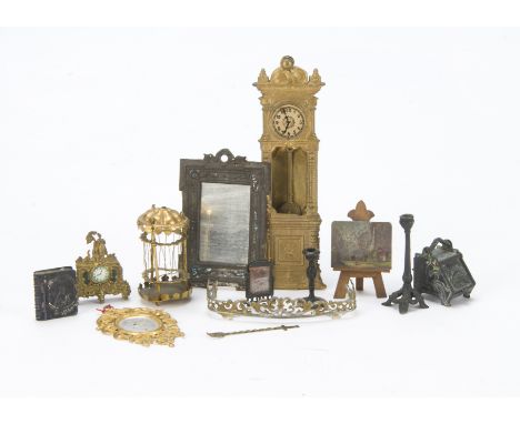 Metal dolls’ house chattels: a cast-metal and tinplate gold painted long case clock with pendulum - 5in. (12.5cm.) high (top 