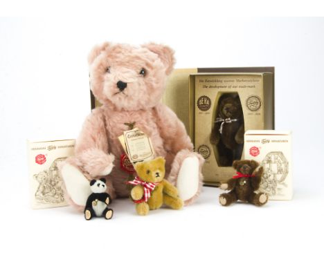 Hermann teddy bears: a pink limited edition 511 of 4000 - 13½in. (34cm.) high; a book box with small brown bear; and three mi