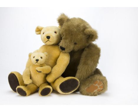 Two Little Folks teddy bears, jointed golden plush bear with medallions - 23½in. (60cm.) largest; and a large synthetic plush