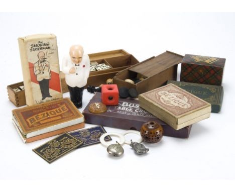 Adult games: a Tartanware Prince Charles card box, a treen and bone lotto wheel, a spherical rattle, The Smoking Statesman, i