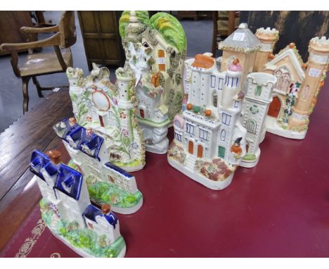 A COLLECTION OF EIGHT ANTIQUE POTTERY SPILL  VASES AND PASTILLE BURNERS OF ARCHITECTURAL FORM.   H. OF LARGEST  28cms.