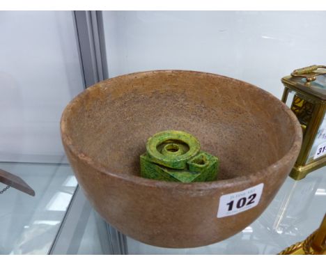 AN EARLY RED STONEWARE DEEP BOWL AND AN EASTERN GREEN GLAZED POTTERY OIL LAMP
