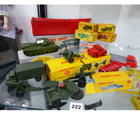 A DINKY 697 FIELD GUN SET, A 651 TANK, A 963 HEAVY TRACTOR, CARS Nos.673,674,231,233 AND 179, A 982 CAR TRANSPORTER.ETC.