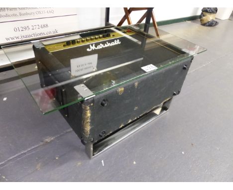 A RETRO COFFEE TABLE CONSTRUCTED FROM A MARSHALL AMPLIFIER WITH CHROME LEGS