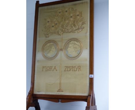 AN ARTS AND CRAFTS WALNUT FRAMED SILK EMBROIDERED FIRE SCREEN PANEL, FLORA AND THE ZEPHYR.