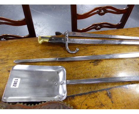 AN UNUSUAL SET OF STEEL FIRESIDE TOOLS CONSTRUCTED FROM ANTIQUE BAYONETS.