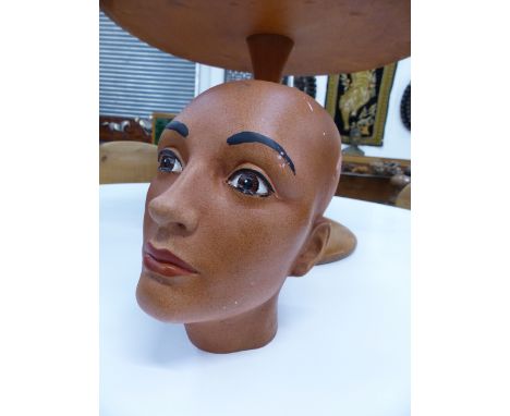 A VINTAGE CERAMIC MANNEKIN HEAD.