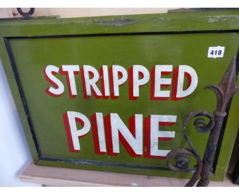 A HAND PAINTED SIGN WITH WROUGHT IRON BRACKET, STRIPPED PINE.