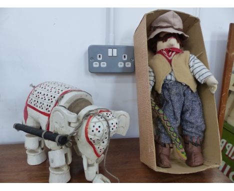 A STRING PUPPET ELEPHANT, A CLOTH COWBOY DOLL, VINTAGE BUILDING BLOCKS,ETC.