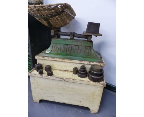 A RARE SET OF RADIO-MALT ADVERTISING BABY SCALES COMPLETE WITH WEIGHTS AND STAND.