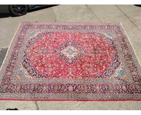 A Persian carpet of classic design 392 x 295 cm.Overall good heavy soft wool carpet with some expected light wear all over, n