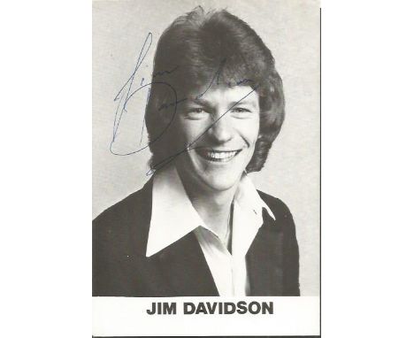 Jim Davidson autographed photo. Black and white 6x4 portrait photo autographed by comedian Jim Davidson.   Good condition.  A