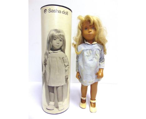 A SASHA D341 4-107 BLONDE GINGHAM DOLL wearing original blue dress, matching pants and white shoes, in original printed card 