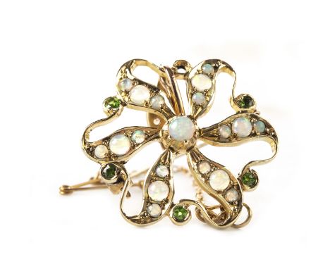 EDWARDIAN OPAL AND GEM SET BROOCH PENDANT, open and with a central round cabochon cut opal with six radiating opal set bars, 