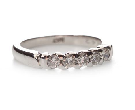 EIGHTEEN CARAT WHITE GOLD DIAMOND SET BAND, set with round brilliant cut diamonds totalling approximately 0.26 carats, size L