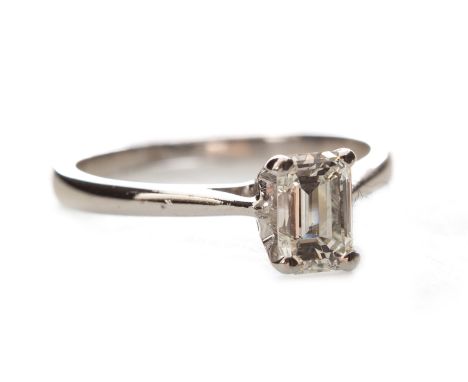 DIAMOND SOLITAIRE RING, the emerald cut diamond of approximately 0.80 carats, in fourteen carat gold, size N, 2.5g