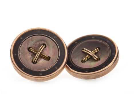 TWO NINE CARAT GOLD BUTTONS, each of circular form, with a central mother of pearl section with overlaid ropework detail, wit