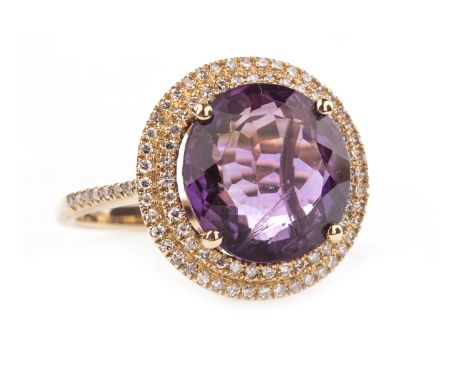 AMETHYST AND DIAMOND RING, the round faceted amethyst 12mm diameter, surrounded by a double halo of round brilliant cut diamo
