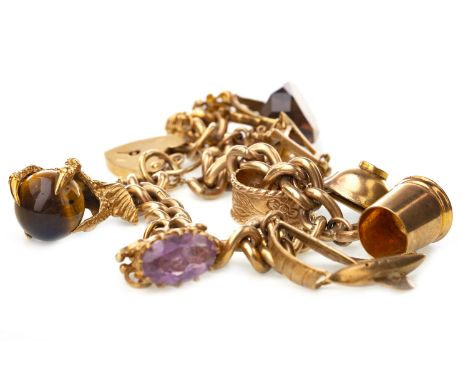 CURB LINK BRACELET, marked 9.375 to each link, populated with charms including a boat and a lantern, some marked for nine car