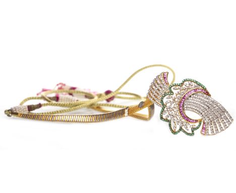 GEM SET NECKLET, with an art deco style gem set drop 53mm high and with channel set red gems and round faceted green and whit