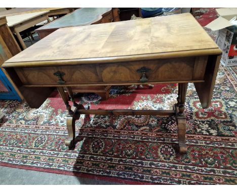 A Regency Style Burr Walnut End Support Sofa Table The Rectangular Top With Two Hinged Flaps Veneered In Continuous Figured V